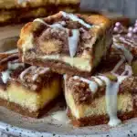 cinnamon roll cheesecake bars - featured image