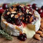 creamy baked brie with cherry compote and almonds - featured image