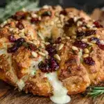 crispy brie and cranberry puff pastry wreath - featured image